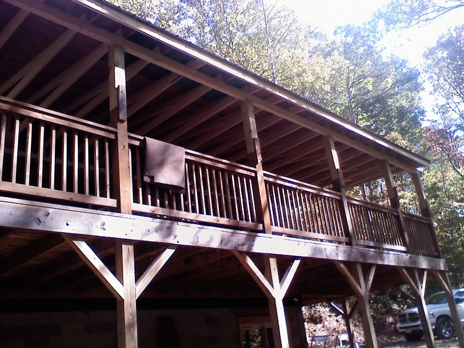 Timber framing under a new elevated porch and deck — Roof Leak Repair in Arkadelphia by Roofing Brothers